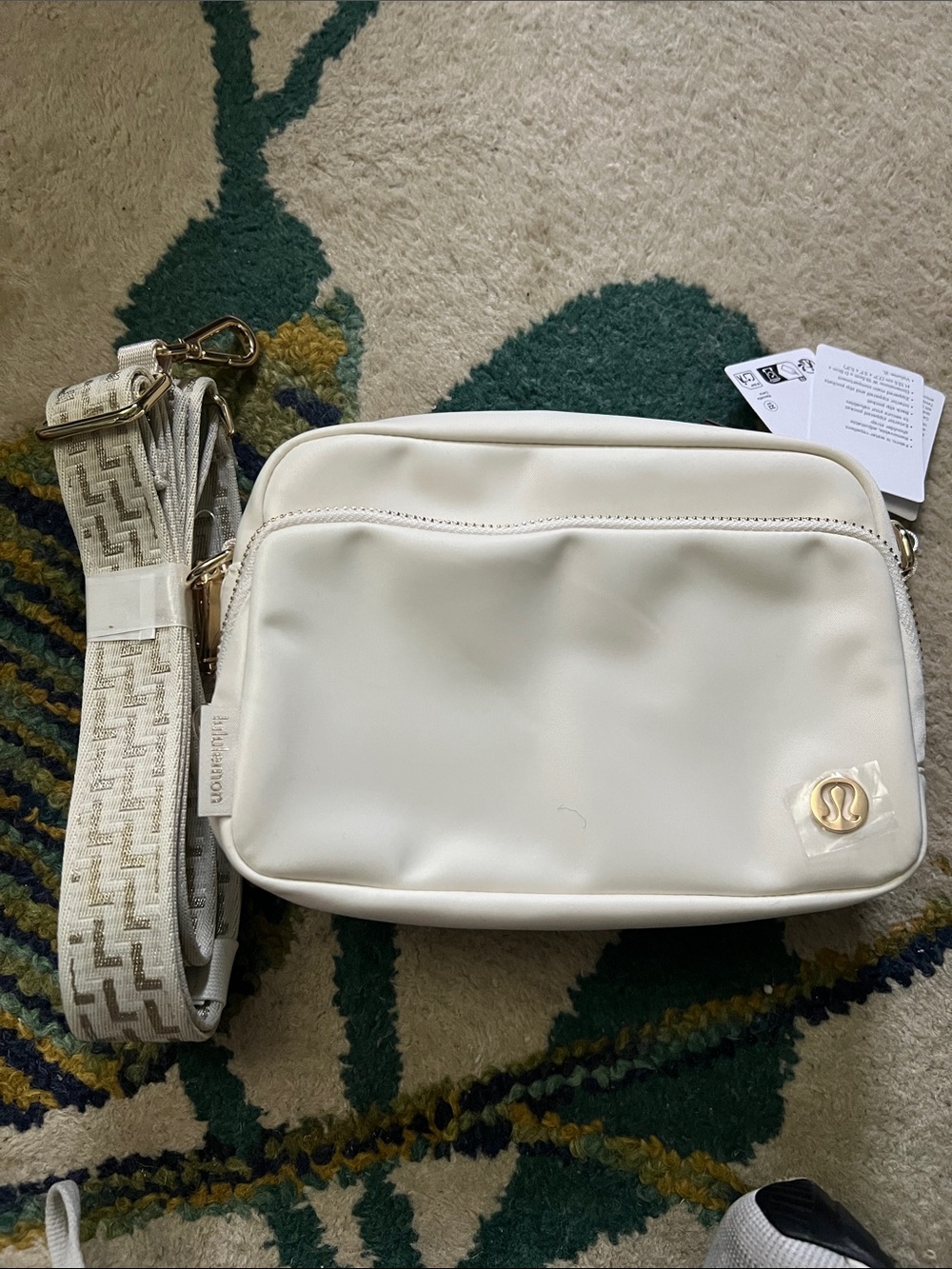 lululemon athletica cream crossbody with patterned strap